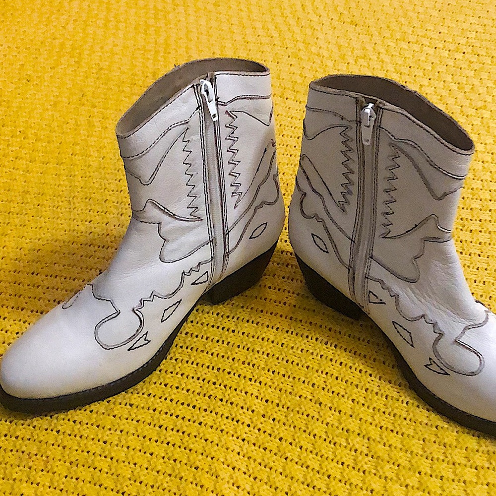 Brand new. NEVER WORN All white sexy cowgirl boots
